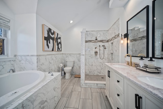 full bathroom with shower with separate bathtub, vanity, toilet, and lofted ceiling