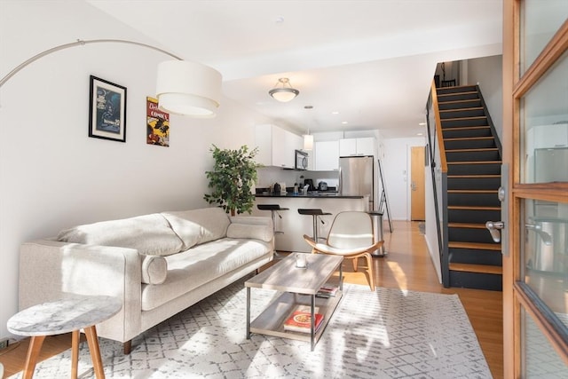 living room with light wood-type flooring