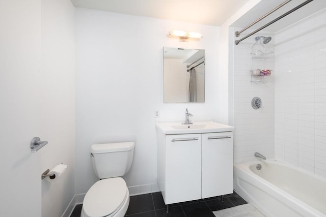 full bathroom featuring vanity, toilet, tiled shower / bath combo, and tile patterned flooring