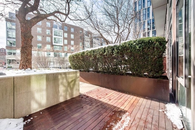 view of snow covered deck