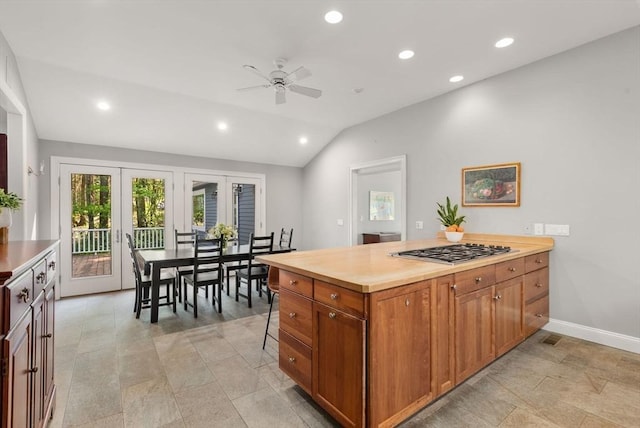 56 Arrowhead Rd, Weston, MA 02493 - kitchen with stainless steel gas cooktop, french doors, lofted ceiling, ceiling fan, and recessed lighting