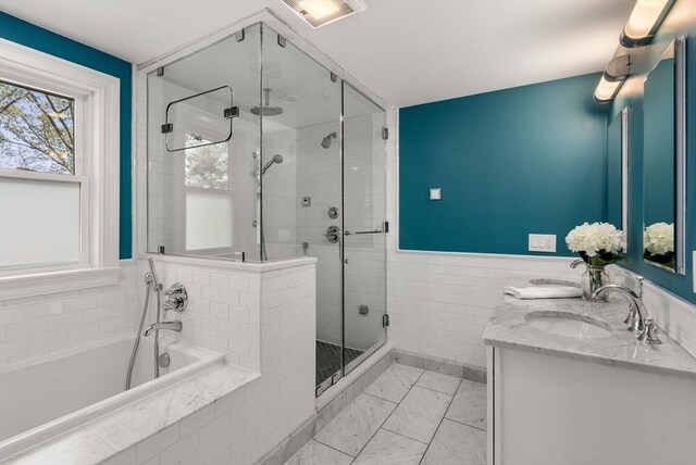 56 Arrowhead Rd, Weston, MA 02493 - bathroom featuring a stall shower, a garden tub, and double vanity