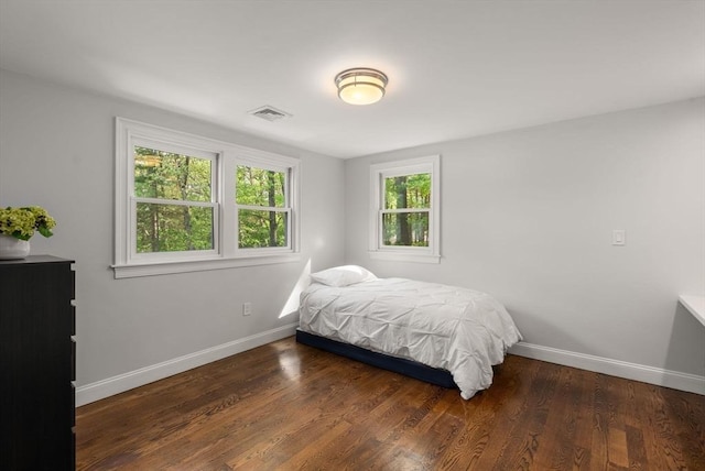 56 Arrowhead Rd, Weston, MA 02493 - bedroom with baseboards and wood finished floors