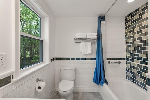 56 Arrowhead Rd, Weston, MA 02493 - bathroom with plenty of natural light, toilet, tile walls, shower / bath combo, and a wainscoted wall