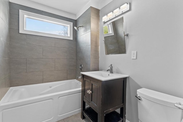 bathroom with toilet, shower / bath combination, plenty of natural light, and vanity