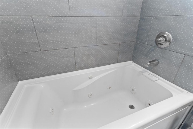 bathroom featuring a whirlpool tub