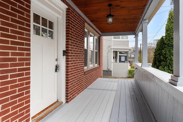 wooden deck featuring a porch