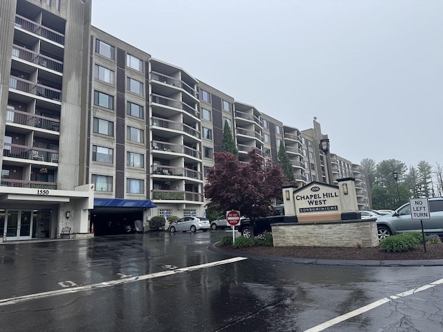 1550 Worcester Rd Unit 503, Framingham, MA 01701 - view of apartment building / complex with uncovered parking
