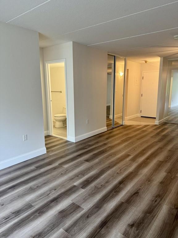 1550 Worcester Rd Unit 503, Framingham, MA 01701 - empty room featuring wood finished floors and baseboards