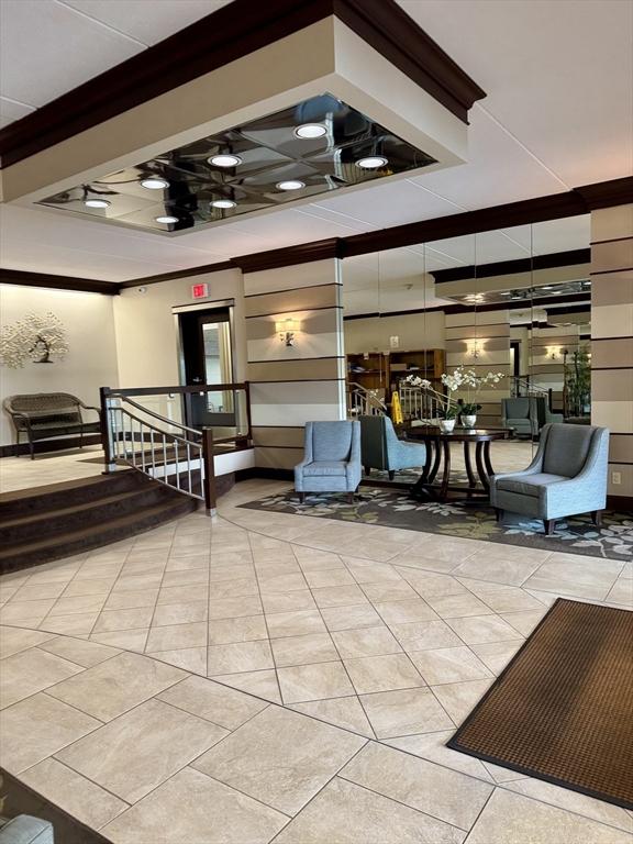 1550 Worcester Rd Unit 503, Framingham, MA 01701 - community lobby featuring crown molding