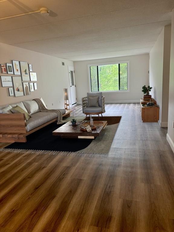 1550 Worcester Rd Unit 503, Framingham, MA 01701 - living room with wood finished floors and baseboards