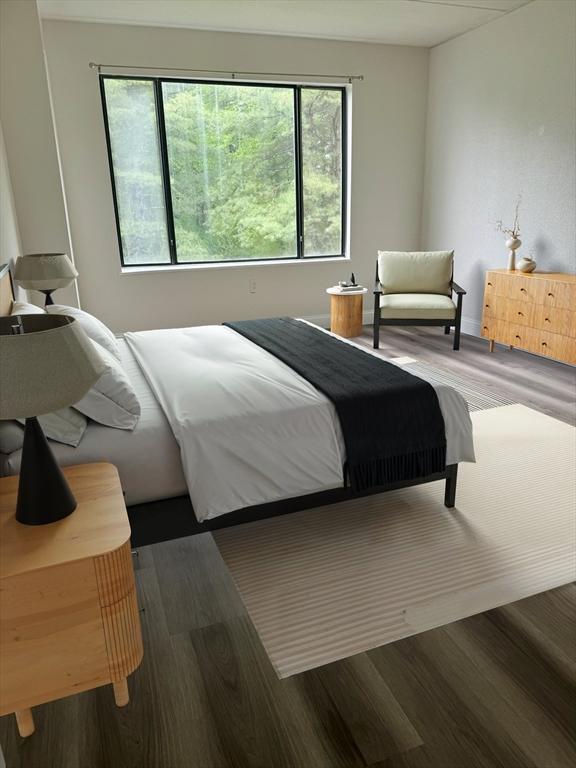1550 Worcester Rd Unit 503, Framingham, MA 01701 - bedroom with wood finished floors