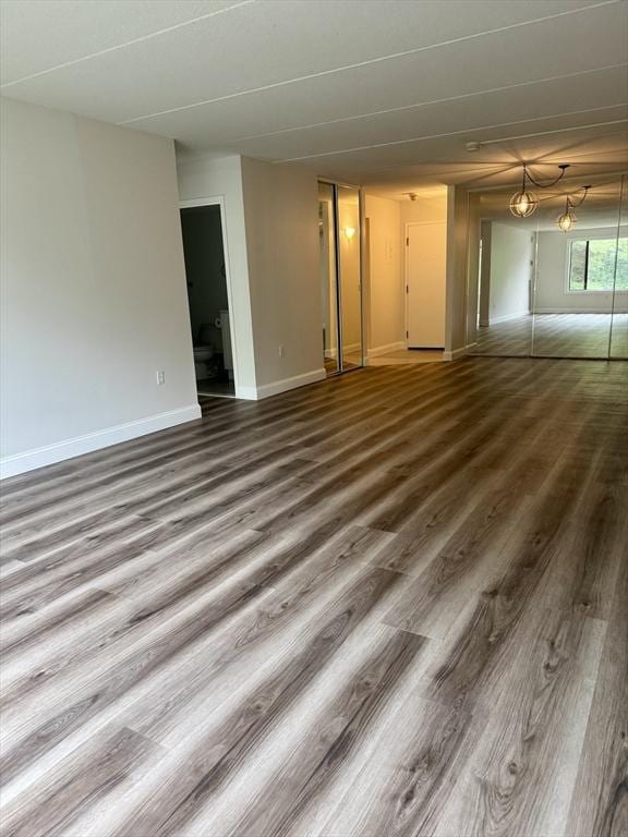1550 Worcester Rd Unit 503, Framingham, MA 01701 - unfurnished room featuring wood finished floors and baseboards