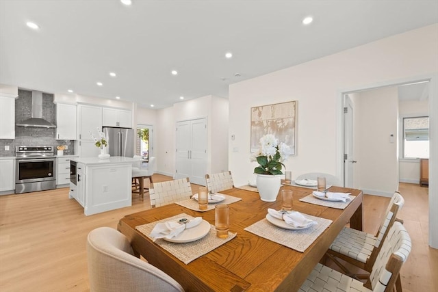 354 Gifford Unit 1, Falmouth, MA 02540 - dining area with healthy amount of natural light, light wood-type flooring, and recessed lighting
