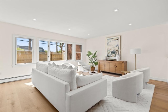 354 Gifford Unit 1, Falmouth, MA 02540 - living room with a baseboard heating unit, light wood-style floors, and recessed lighting