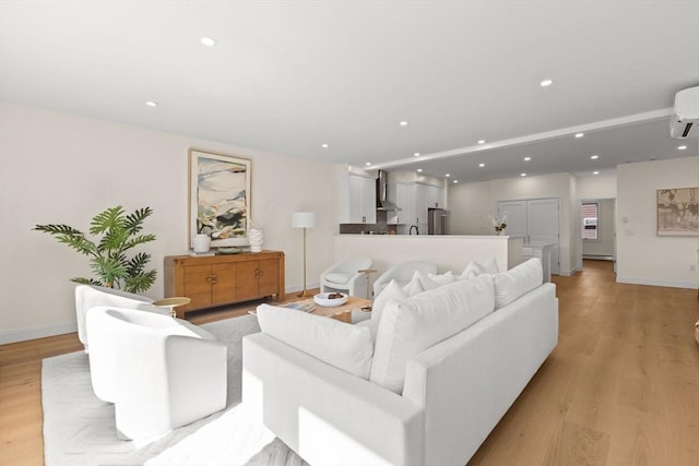 354 Gifford Unit 1, Falmouth, MA 02540 - living room featuring baseboards, recessed lighting, light wood-type flooring, and a wall unit AC