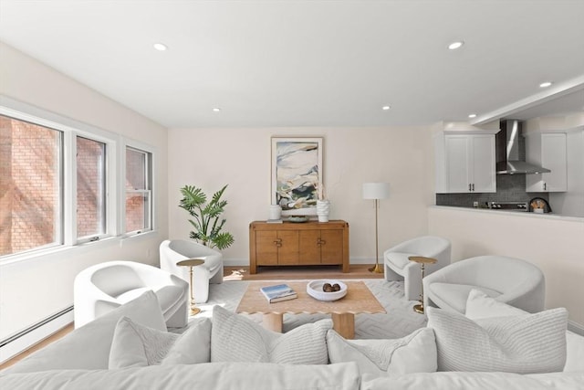 354 Gifford Unit 1, Falmouth, MA 02540 - living room featuring a baseboard radiator, recessed lighting, wood finished floors, and baseboards