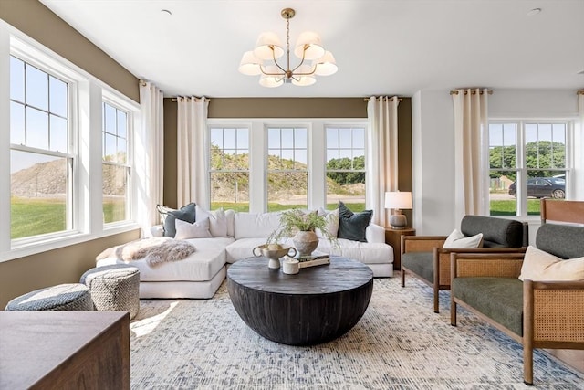 sunroom with a notable chandelier