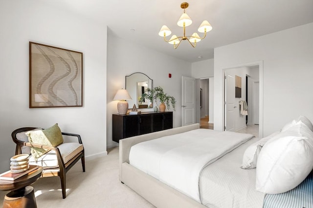 bedroom featuring baseboards, an inviting chandelier, and light colored carpet