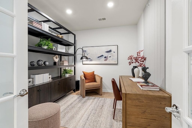 home office with recessed lighting, visible vents, and light wood finished floors