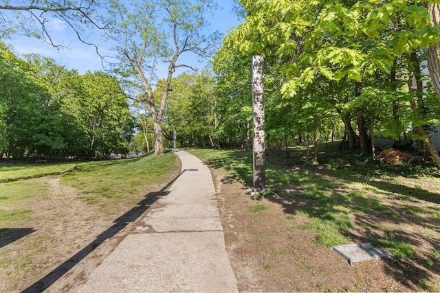 surrounding community with a lawn