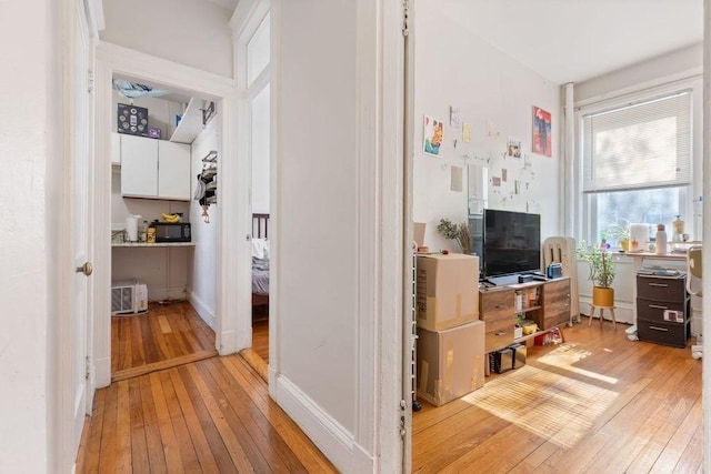 hall with light wood finished floors