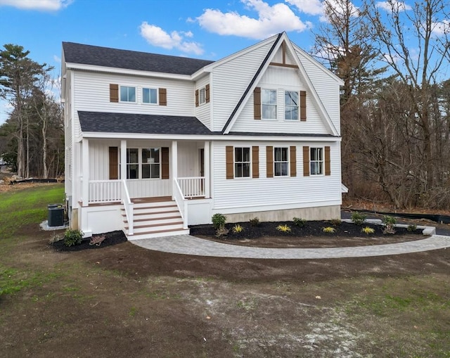 view of front facade featuring a porch and cooling unit