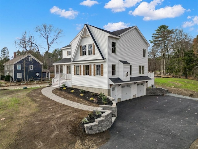 view of property exterior with a garage