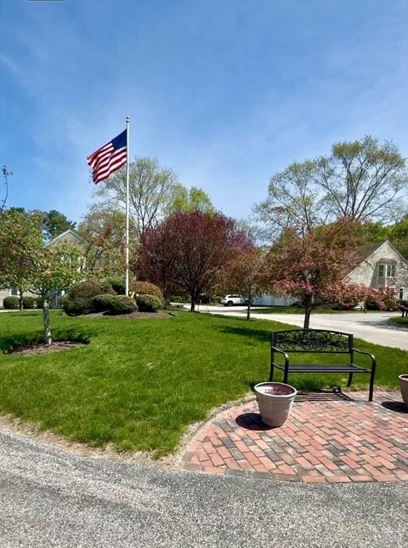 surrounding community with a yard