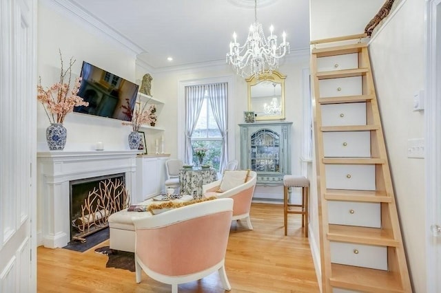 376 Marlborough St Unit 4, Boston, MA 02116 - sitting room featuring a fireplace with flush hearth, crown molding, light wood-style floors, and a chandelier
