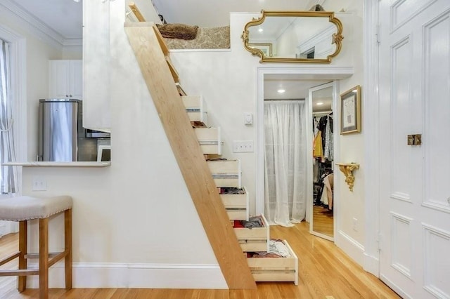 376 Marlborough St Unit 4, Boston, MA 02116 - corridor featuring ornamental molding and wood finished floors