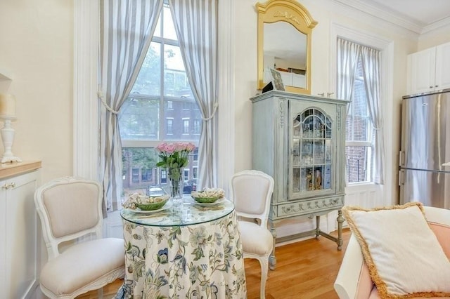 376 Marlborough St Unit 4, Boston, MA 02116 - living area with crown molding and light wood-style flooring