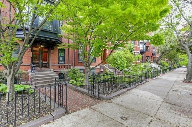 376 Marlborough St Unit 4, Boston, MA 02116 - view of community with a fenced front yard and stairs