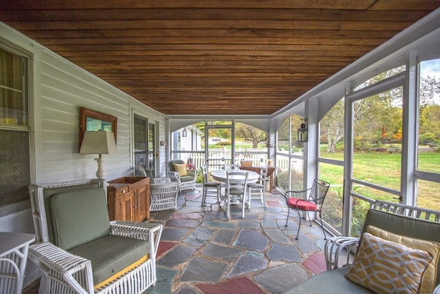 sunroom / solarium with wood ceiling and plenty of natural light