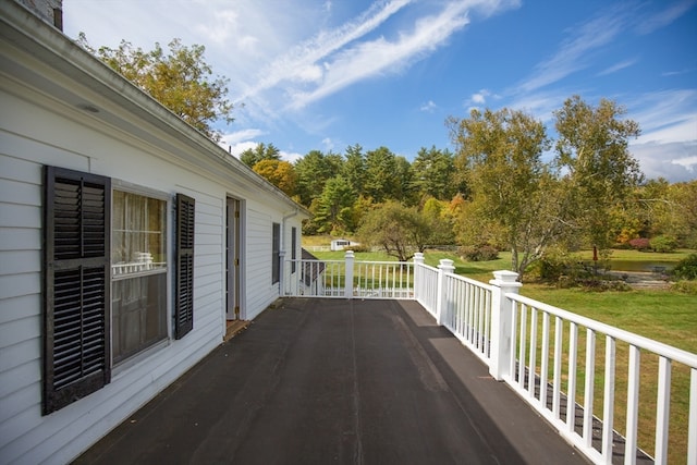 deck featuring a yard