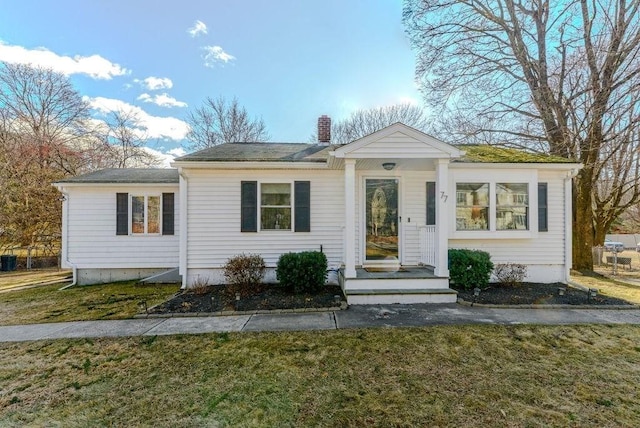 view of front of home with a front yard