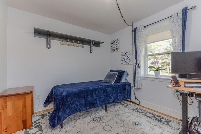 bedroom with light hardwood / wood-style flooring