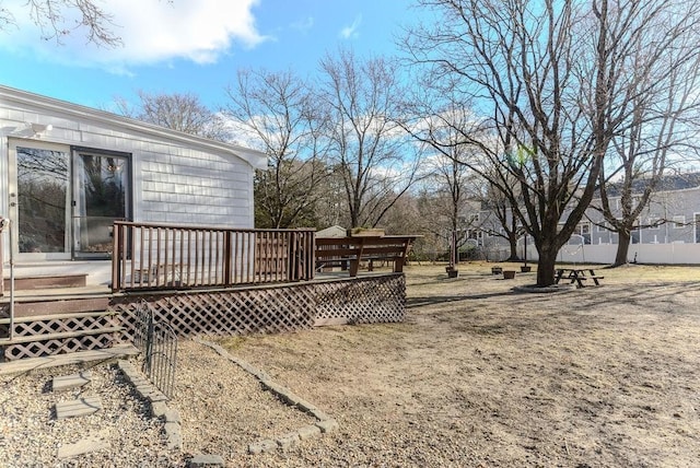 view of yard featuring a deck