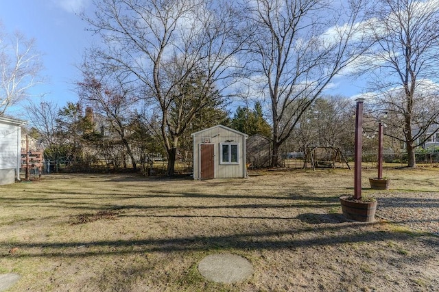 view of yard with a storage unit