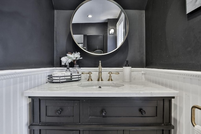 bathroom featuring wainscoting and vanity