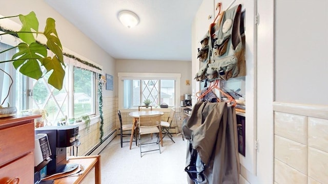 142 Dale St, Waltham, MA 02451 - walk in closet with baseboard heating and a baseboard heating unit