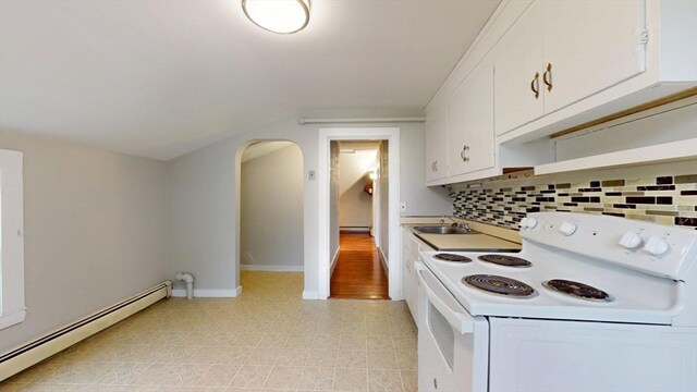 142 Dale St, Waltham, MA 02451 - kitchen with white electric range, a baseboard radiator, white cabinetry, decorative backsplash, and lofted ceiling