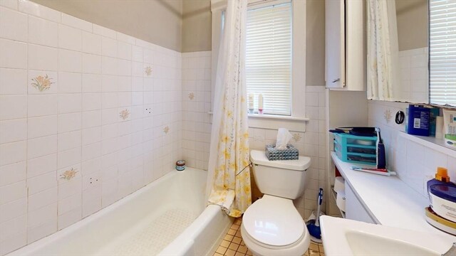 142 Dale St, Waltham, MA 02451 - full bath with tile walls, shower / bath combination with curtain, toilet, and vanity