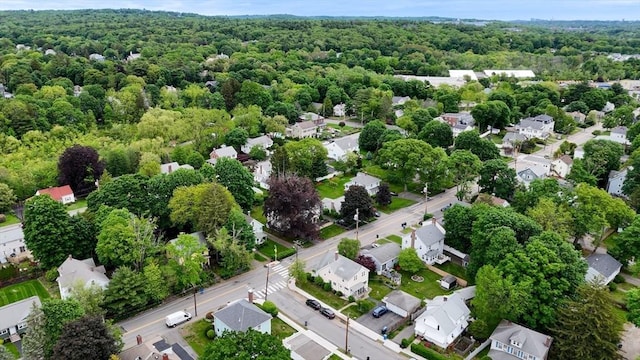 142 Dale St, Waltham, MA 02451 - aerial perspective of suburban area featuring a heavily wooded area