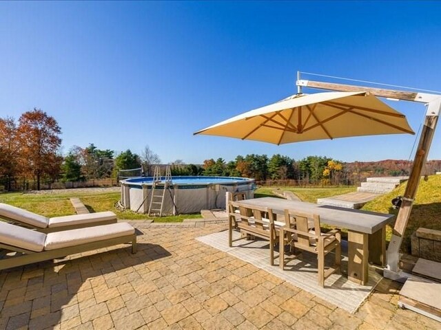 143 Clemence Hill Rd, Southbridge, MA 01550 - view of patio / terrace with outdoor dining space and an outdoor pool