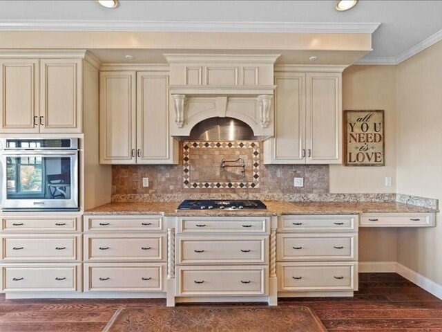 143 Clemence Hill Rd, Southbridge, MA 01550 - kitchen with appliances with stainless steel finishes, dark wood-style floors, light stone counters, baseboards, and crown molding