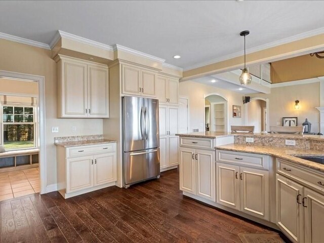 143 Clemence Hill Rd, Southbridge, MA 01550 - kitchen featuring freestanding refrigerator, arched walkways, dark wood-style flooring, pendant lighting, and crown molding