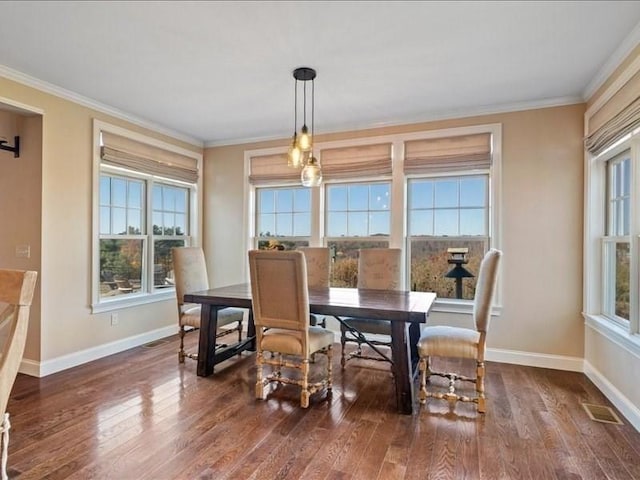 143 Clemence Hill Rd, Southbridge, MA 01550 - dining area with baseboards, wood finished floors, and crown molding