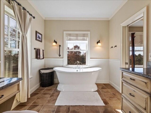 143 Clemence Hill Rd, Southbridge, MA 01550 - full bathroom with wainscoting, a freestanding tub, tile patterned flooring, ornamental molding, and vanity