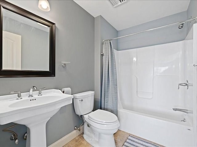 143 Clemence Hill Rd, Southbridge, MA 01550 - bathroom featuring toilet, shower / bathtub combination with curtain, baseboards, tile patterned flooring, and a sink